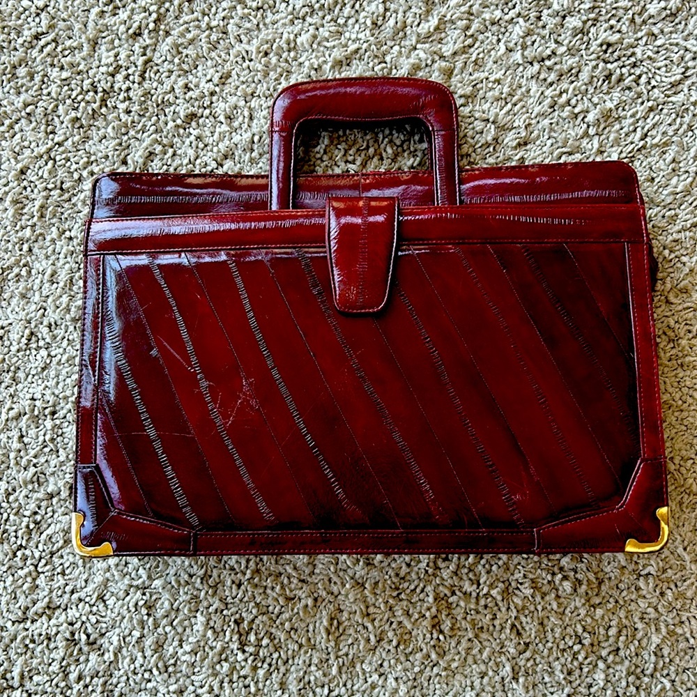 Vintage genuine eel skin briefcase burgundy color.